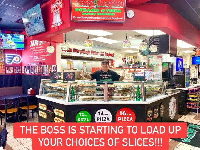 The pizza counter and Philly memorabilia inside Johnny Longhots Voorhees